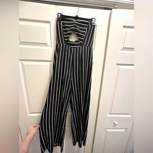 Black with white stripes tube top jumpsuit. Size M. Lightly worn once or twice.